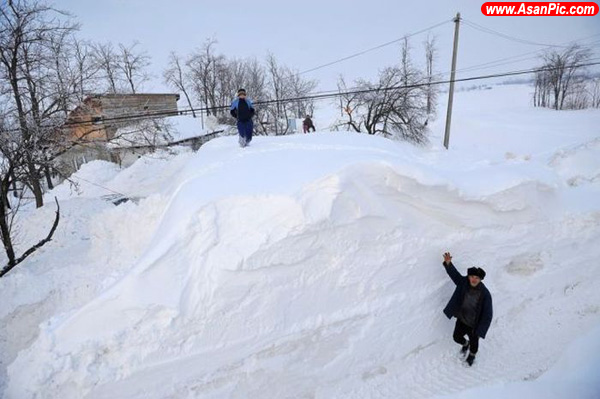 تصاویری از روستایی در زير برف